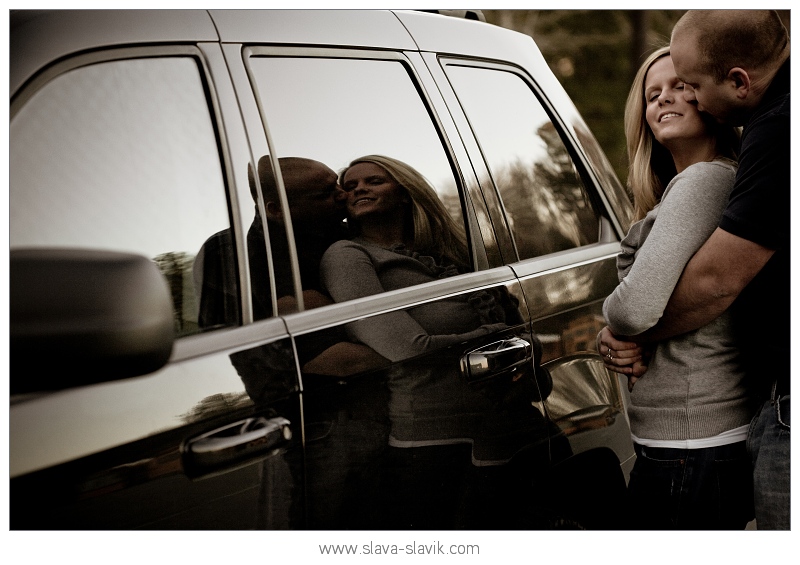 Couple Reflecting on a Car