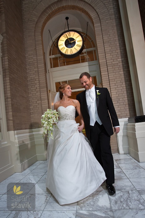 Bride and groom with clock