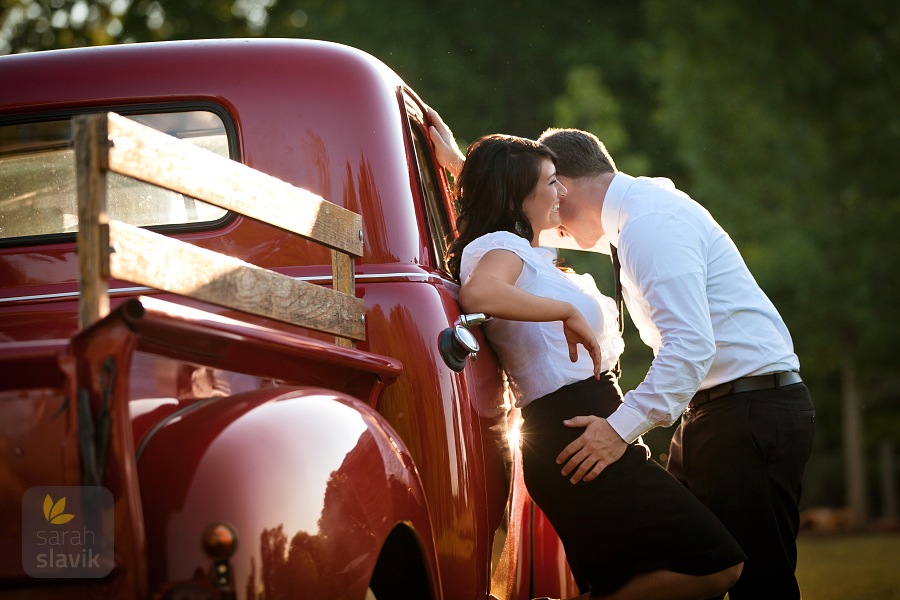 Couple with a red truck