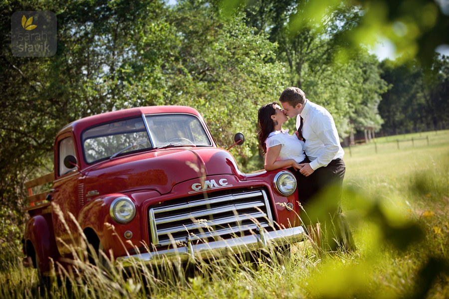 Kissing couple with a truck Kissing couple with a truck