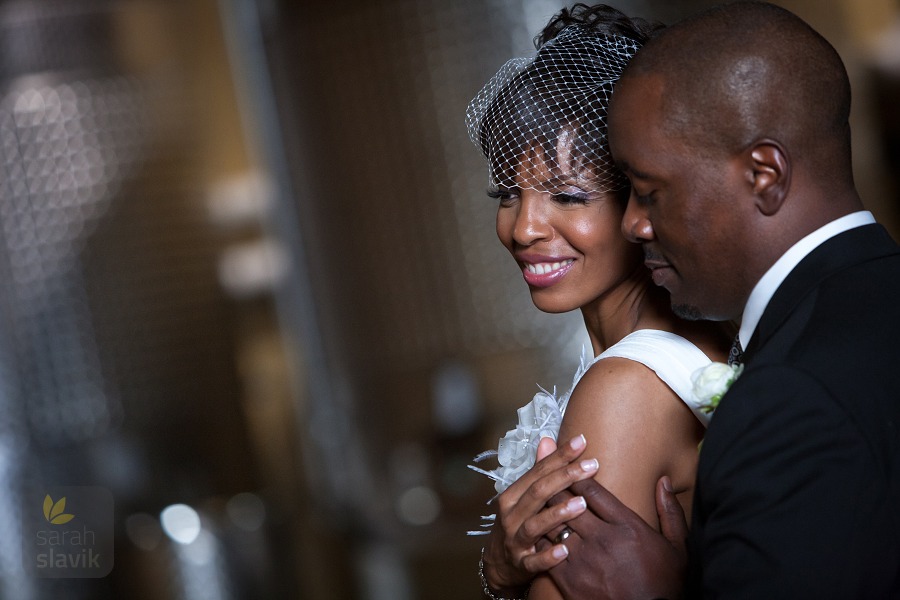 Wedding couple with wine tanks